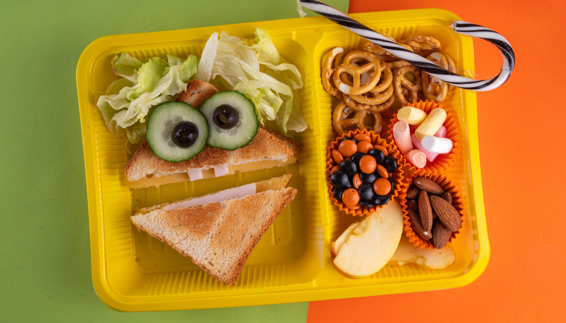 kid-friendly lunch tray with different kinds of food